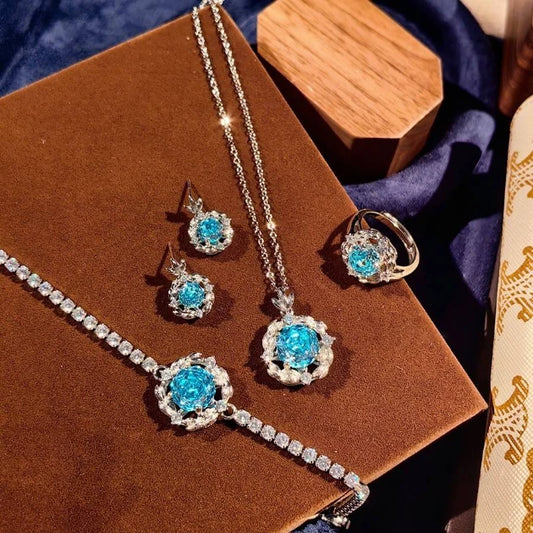 Blue Rose Crystal 4-Piece Matching Jewelry Set Full Display, Necklace Ring Bracelet Earrings Collection